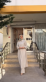 NELL TAŞ